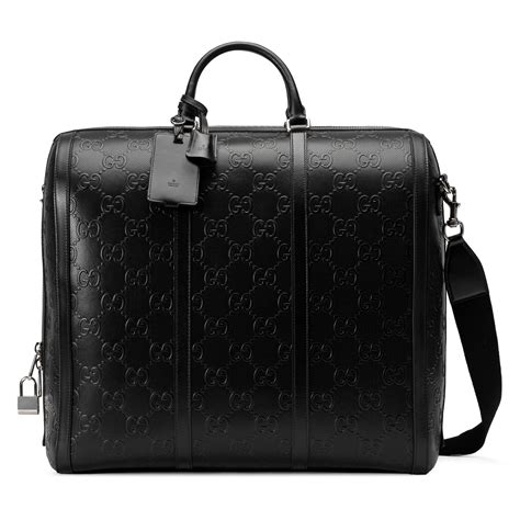 gucci black bowling bag|Gucci embossed duffle bag.